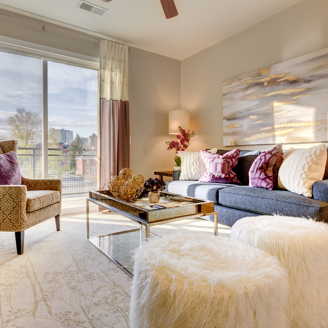 Encore Apartments - Living Room with Decorative Painting on the Wall