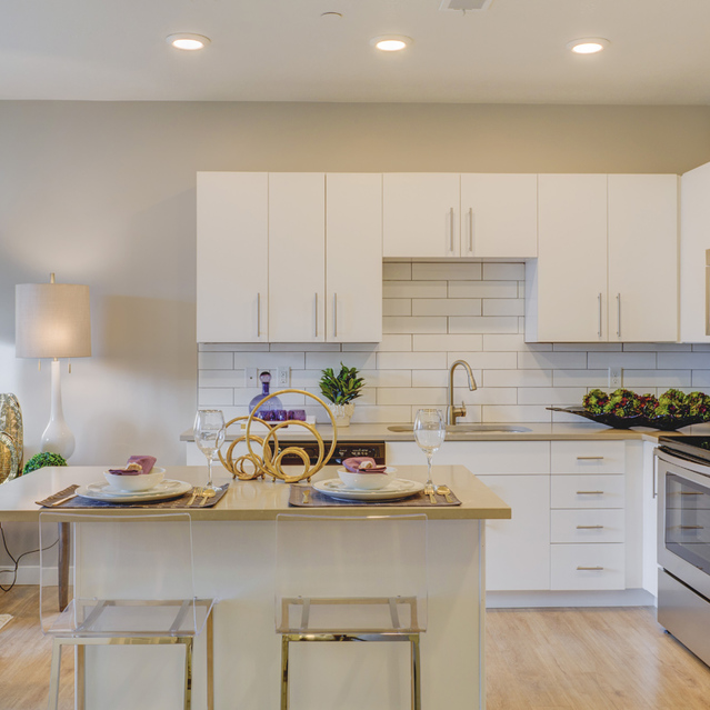 Encore Apartments - Spacious Modern Kitchen And Dining Area